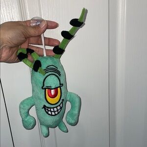 Green Plush Toy with Antennae